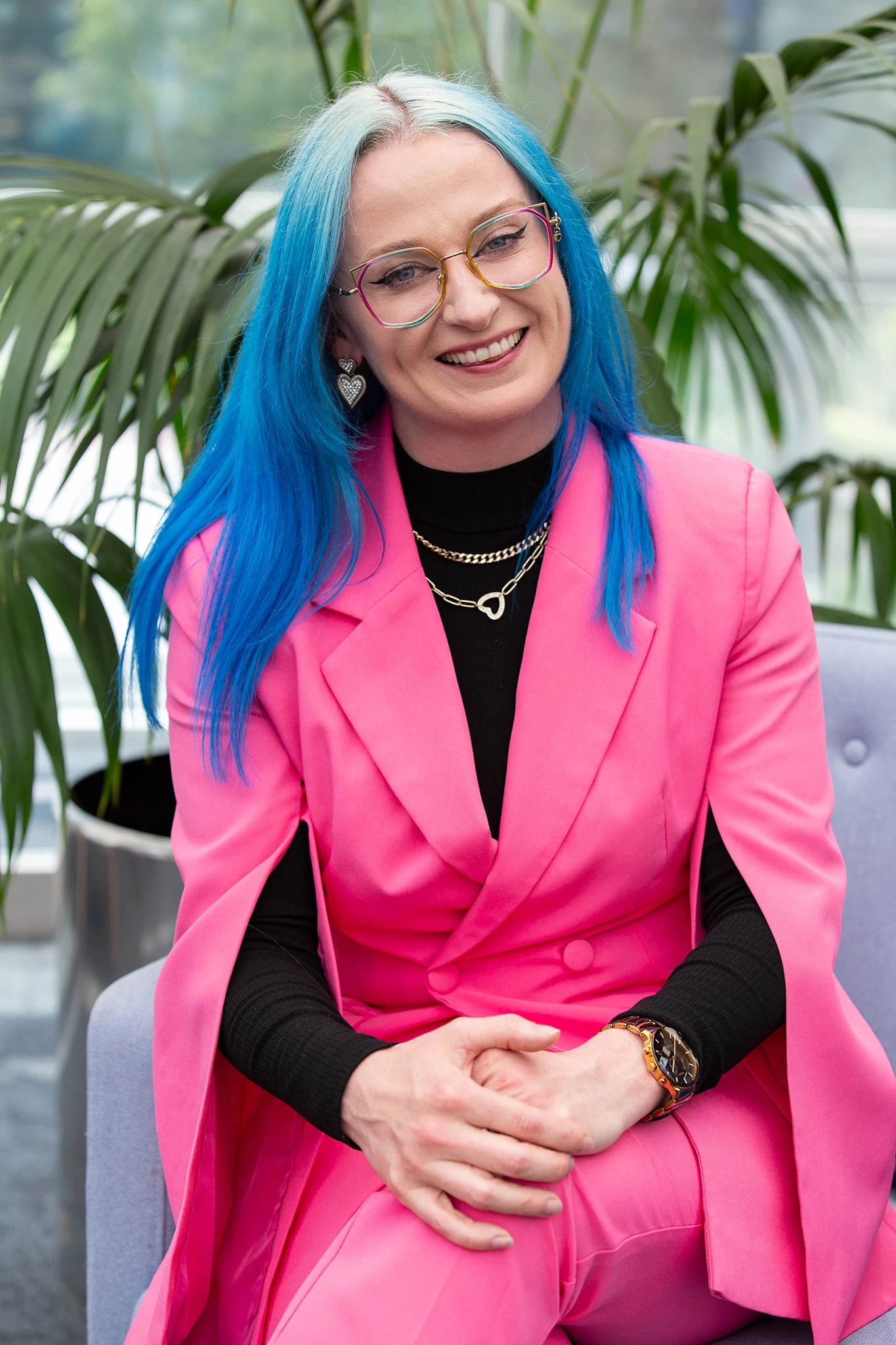 Lifestyle headshot photography - female with blue hair & bright clothes