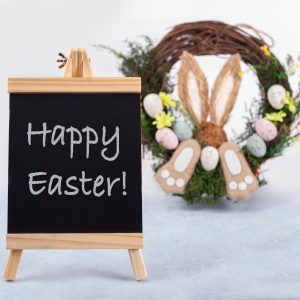 Easter stock preview image from Photography by Fran - easter wreath with Happy Easter message on chalkboard on light background