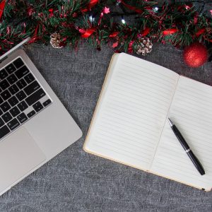 Business Christmas stock preview image from Photography by Fran - laptop with open notebook & Christmas decorations