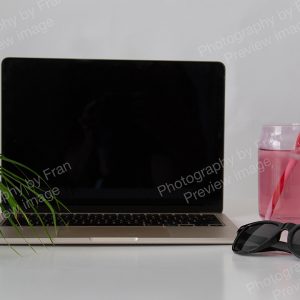 Summer business stock preview image from Photography by Fran - open laptop with drink and sunglasses