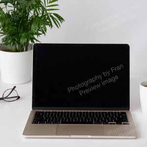 Business stock preview image from Photography by Fran - open laptop on desk with glasses & mug
